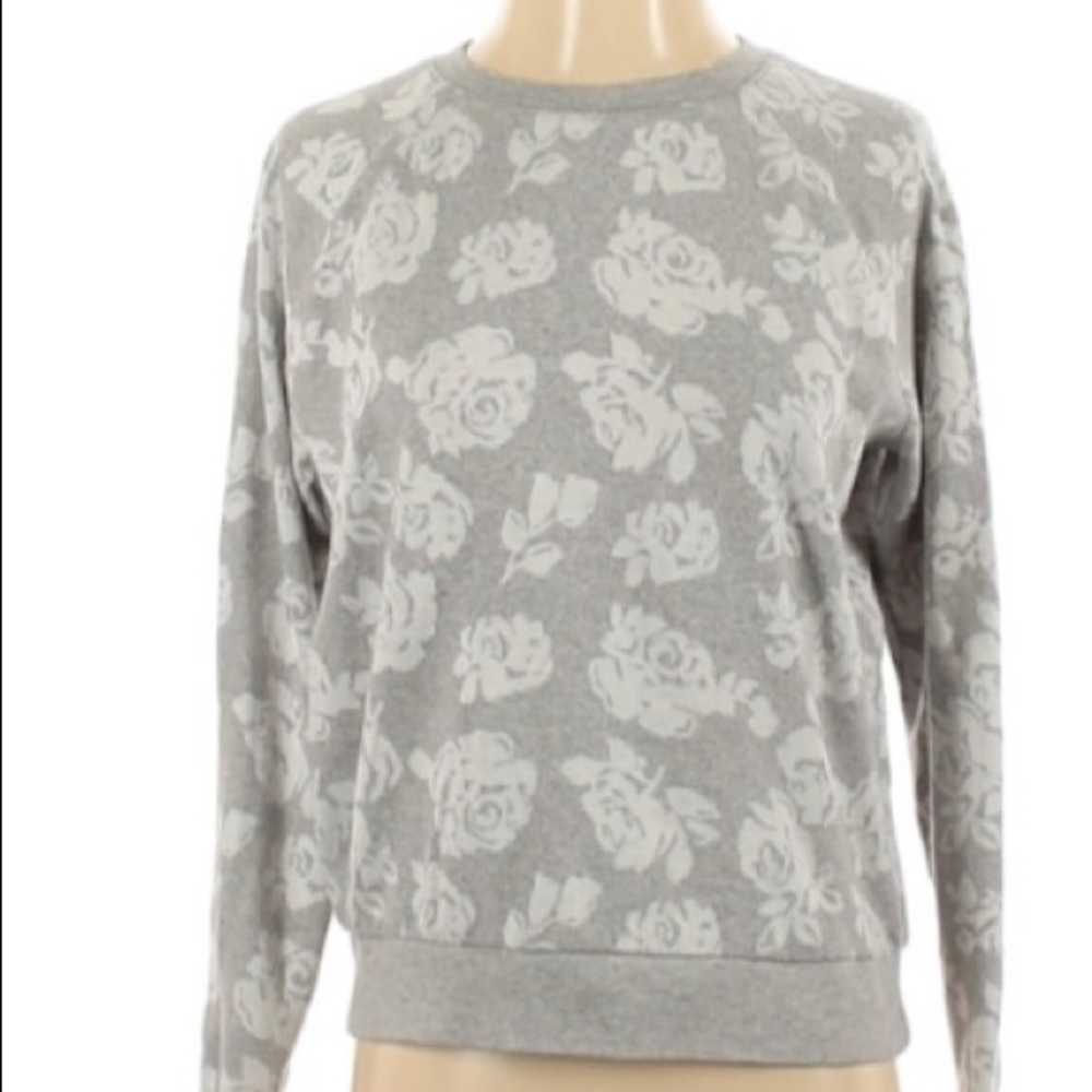 Bethany Mota white floral print sweater.